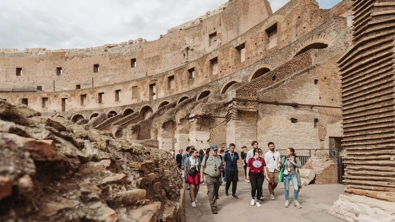 Colosseum, Roman Forum and Palatine Hill Tour in Rome - Entering the Colosseum’s first and second tiers