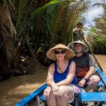Cu Chi Tunnels & Mekong Delta Day Tour - Morning at Cu Chi: tunnels, traps, and cassava