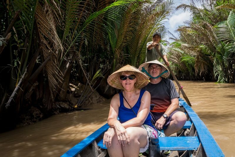 Cu Chi Tunnels & Mekong Delta Day Tour - Morning at Cu Chi: tunnels, traps, and cassava