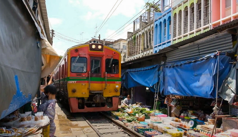 Damnoen Saduak Floating Market and Camping experience 2 Days 1 Night Tour from Bangkok - Maeklong’s market on the railway tracks