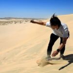 Doha Half-Day Desert Safari & Inland Sea Experience - Sandboarding: fun on the way down