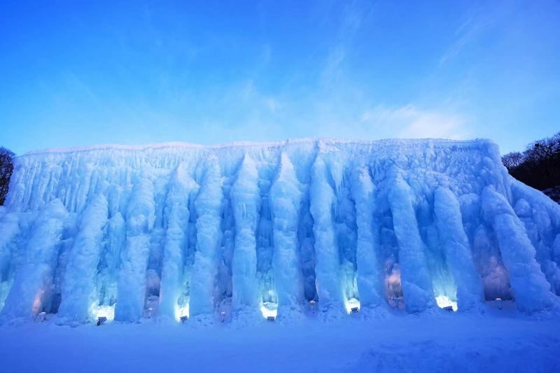 Dreamy ice sculptures decorated with lights-Lake Shikotsu Ice Wave Festival half-day tour at nightfall from Sapporo - Two hours among the sculptures