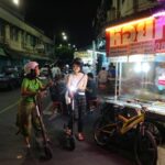 E-Scooter Night Tour with Local Street Food - Local lanes before the landmark stops