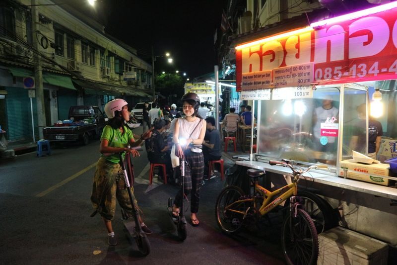 E-Scooter Night Tour with Local Street Food - Local lanes before the landmark stops