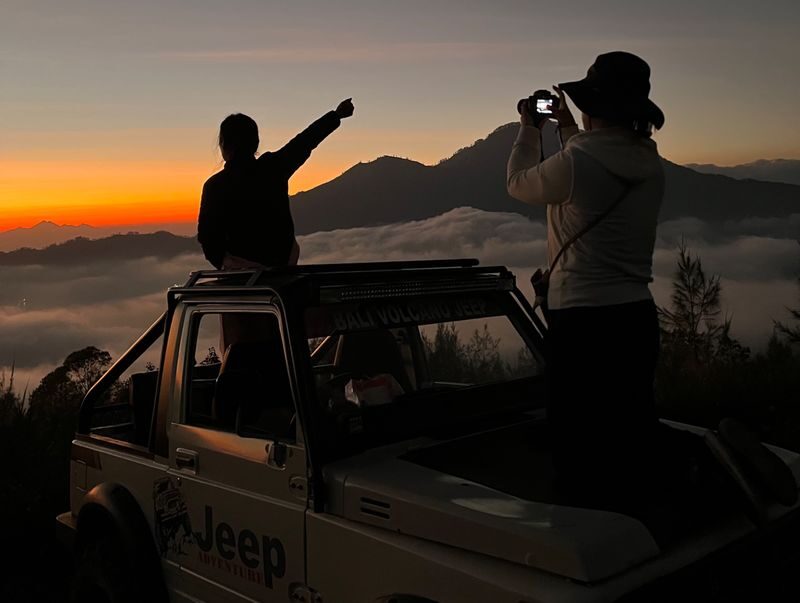 Eco-conscious Mount Batur Sunrise Jeep Tour Optional Photographer - Sunrise and the Black Lava stop