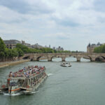 Eiffel Tower Guided Tour with Seine River Cruise - Walking into the Eiffel Tower with a guide