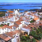 Evora and Monsaraz Village Day Tour from Lisbon with Wine Tasting - Évora’s Roman Temple and cathedral