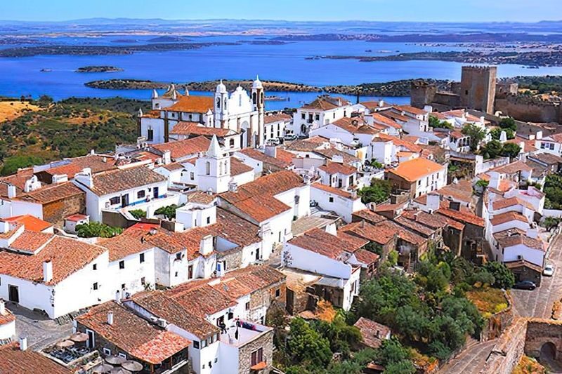Evora and Monsaraz Village Day Tour from Lisbon with Wine Tasting - Évora’s Roman Temple and cathedral