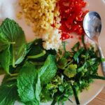 Explore a local ethnic market and prepare Naxi cuisine with a Naxi host. - Cook three dishes in Fancy’s family kitchen