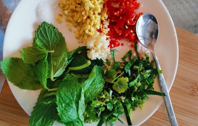 Explore a local ethnic market and prepare Naxi cuisine with a Naxi host. - Cook three dishes in Fancy’s family kitchen