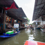 Floating Market Grand Palace and Chao Phraya River View Tour - A 40-minute boat ride at Damnoen Saduak