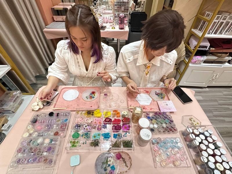 Floral Resin Coaster Workshop by Floral Knots at Orchard Gateway - Mixing resin, with a little patience
