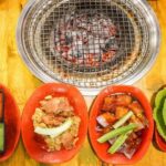 Food and Sightseeing Night Tour with Aodai Rider in Da Nang - Bridges, markets, and a city in motion