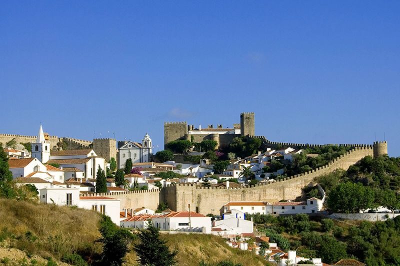 From Lisbon: Fatima, Nazare & Obidos Day Tour - 3 UNESCO Highlights - Fátima: a meaningful hour at the sanctuary