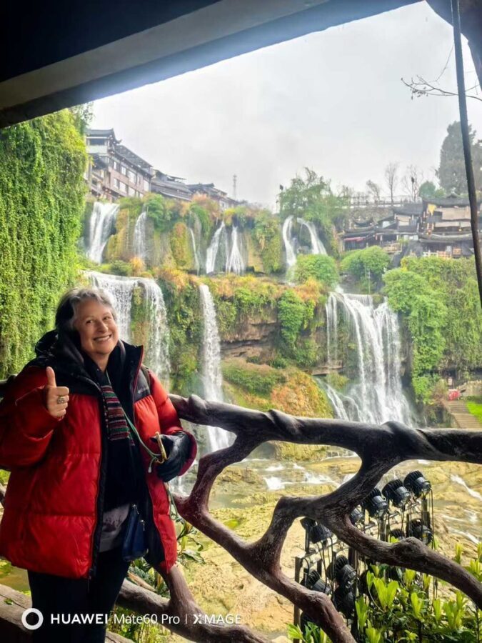 Furong Ancient Town Evening Waterfall & Stilt Houses Experience - The waterfall after dark