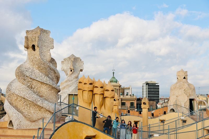 Gaudi Houses & Sagrada Familia Barcelona Full Day Walking Tour - A walk to Casa Milà, with details worth watching for