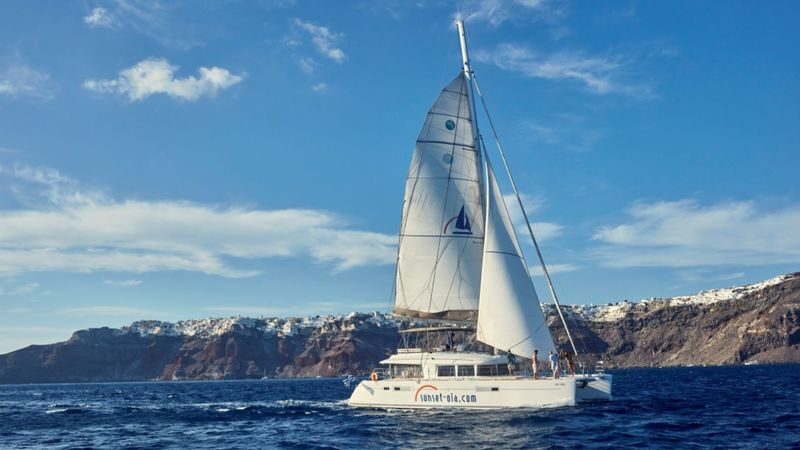 Gems of Santorini catamaran cruise experience with meal - A Greek BBQ meal and drinks on board