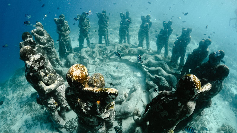 Gili Islands Turtle Snorkeling BBQ Cruise from Gili Trawangan - The Gili Meno statues: striking, and often busy