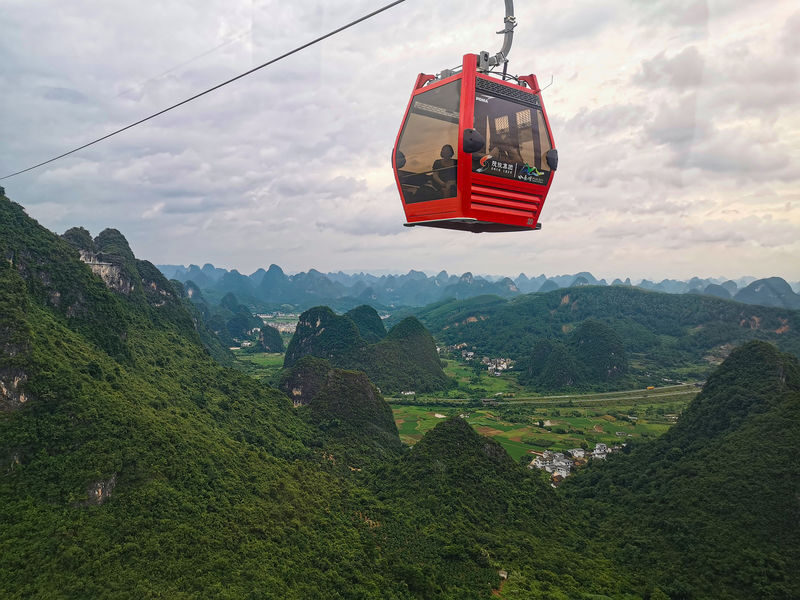 Guilin Li River 3-Star Cruise, Yangshuo Yinyan Cave, Ruyi Peak, Yulong River Bamboo Rafting, Xianggong Mountain, and Xingping 3-Day Private Tour - Day 2: Silver Cave below, Ruyi Peak above