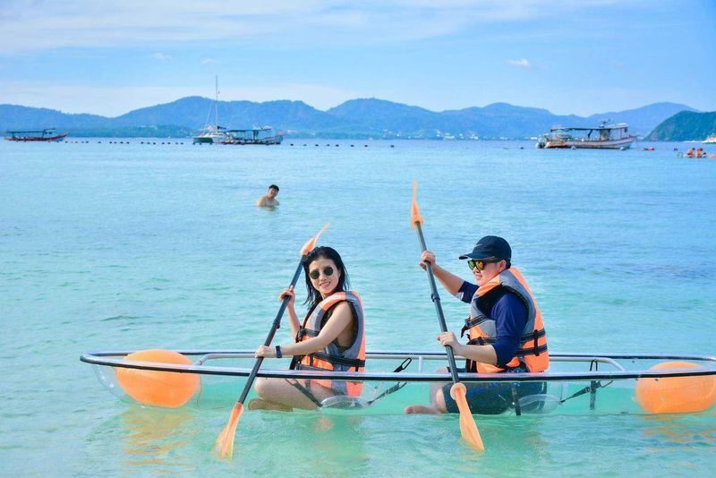 Half Day Coral Island and Sunset by Sailing Catamaran from Phuket - Coral Island: beach time first, snorkeling second