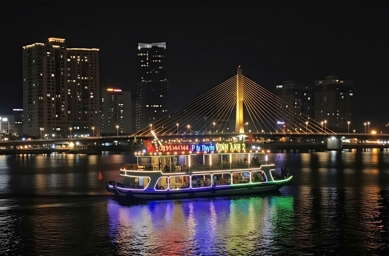 Han River by Night by Vinh Anh Cruise in Da Nang - The Dragon Bridge show takes careful timing
