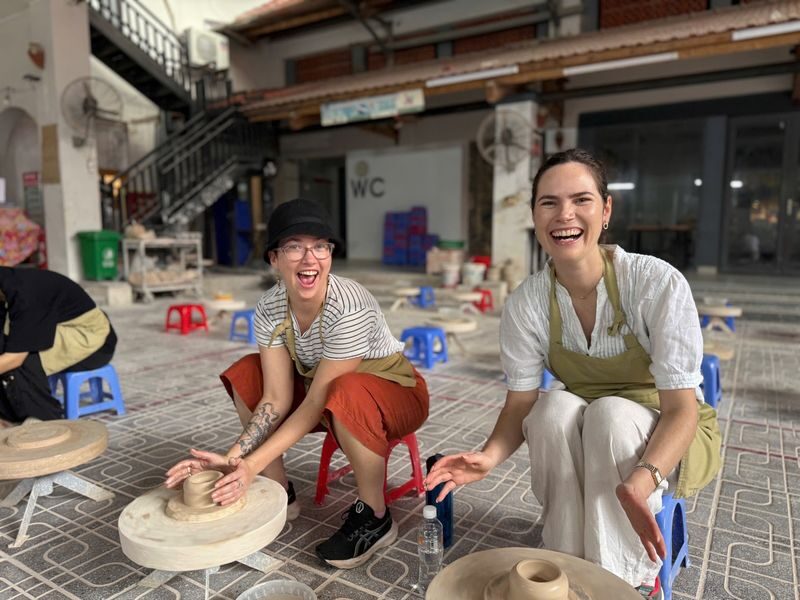 Hanoi Bat Trang Ceramic Village Half-Day Tour with Electric Motorbike - At the pottery wheel and workshop