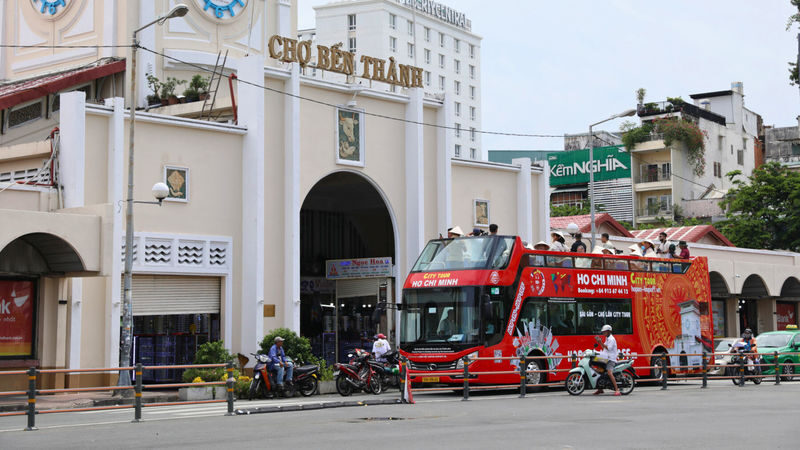 Ho Chi Minh City Highlights & Chinatown by Hop-On Hop-Off Bus with Guide - What the view from the top deck adds