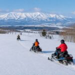 Hokkaido Biei Chiyoda Farm Snowmobile Experience | Includes Farm-Limited Jersey Milk - Riding solo, or sharing with a child