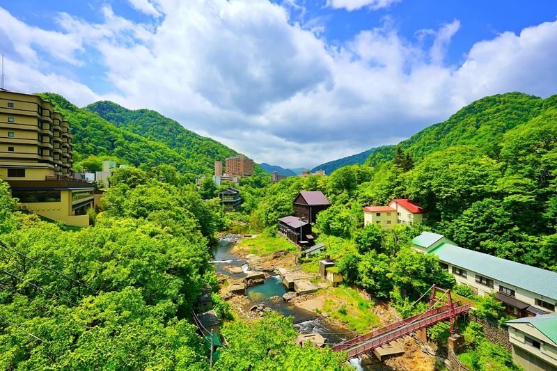 Hokkaido One-Day Tour: Hoheikyo Gorge, Jozankei, Lake Toya, Showa Shinzan, and Mount Yotei Spring Water Park (Departing from Sapporo) - Jozankei: forest views and a chance to pause