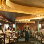 Hue: Perfume River Dining Cruise Experience By Hueritage Cruise - Reading Hue from the water