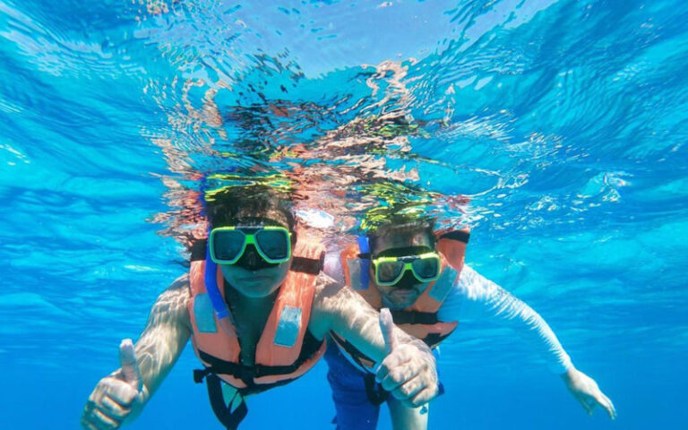 Isla Mujeres Catamaran Adventure with Snorkeling from Cancun - Lunch and a beach-club pause
