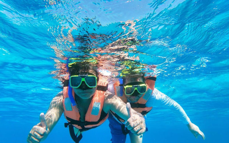 Isla Mujeres Catamaran Adventure with Snorkeling from Cancun - Lunch and a beach-club pause