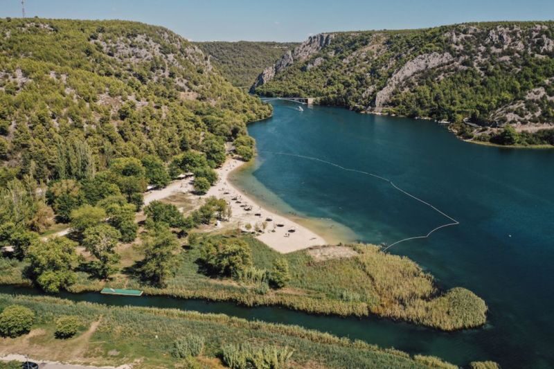Krka Waterfalls Tour with Boat Cruise & Swimming from Split - Walking to Skradinski Buk