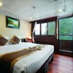 Le Journey Classic 2D1N Cruise: Ha Long Bay, Sung Sot, Ti Top - Day one: cave, island, and sunset