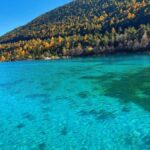 Lijiang Jade Dragon Snow Mountain & Blue Moon Valley Full-Day Tour with Ropeway Ride - Riding the ropeway up Jade Dragon Snow Mountain
