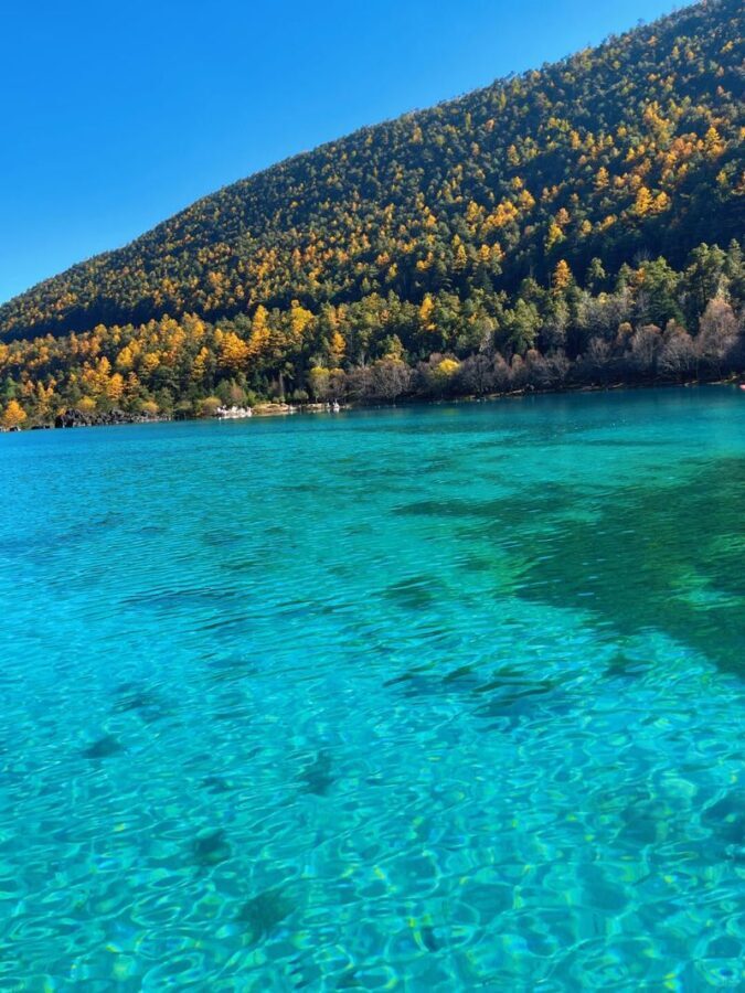 Lijiang Jade Dragon Snow Mountain & Blue Moon Valley Full-Day Tour with Ropeway Ride - Riding the ropeway up Jade Dragon Snow Mountain
