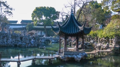 Lion Forest Garden Admission Ticket in Suzhou - The pond and zigzag bridge offer a change of pace