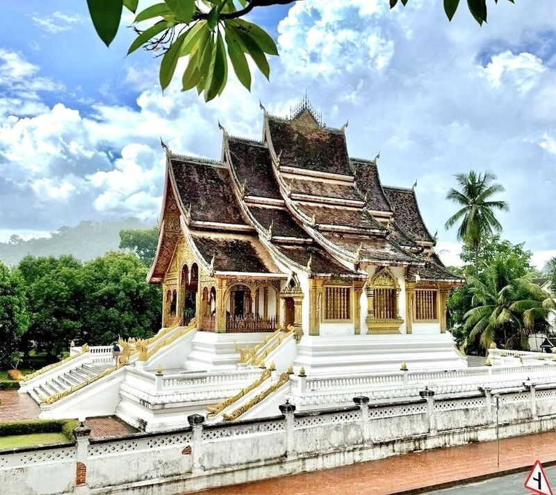 LuangPrabang Morning Alms Giving City Tour& Kuang Si Falls - Market morning, royal rooms and temple roofs