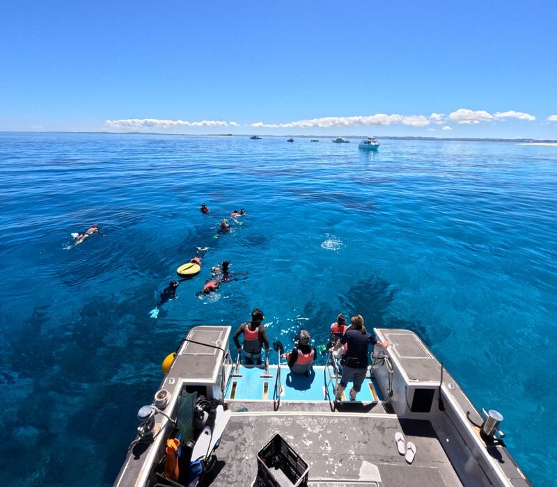 Okinawa Kerama Islands Snorkeling Day Trip (Free Pickup, Photography) Optional Shared Boat/Private Charter - A shared boat with an instructor nearby