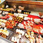 One-day tour experience of Motonosumi Shrine and Mount Sarakura - Karato Market: fresh seafood, with a clock running