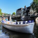 Open Boat Canal Cruise Tour in Amsterdam - Choosing between Central Station and Prinsengracht