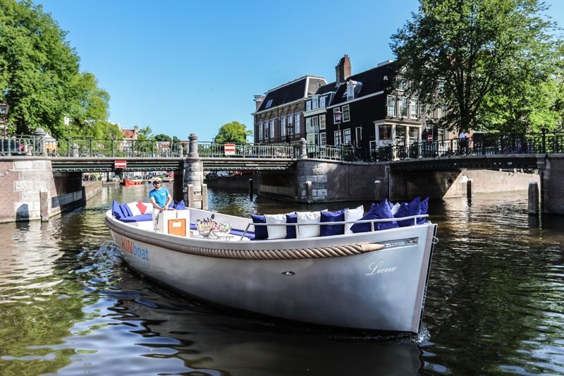 Open Boat Canal Cruise Tour in Amsterdam - Choosing between Central Station and Prinsengracht