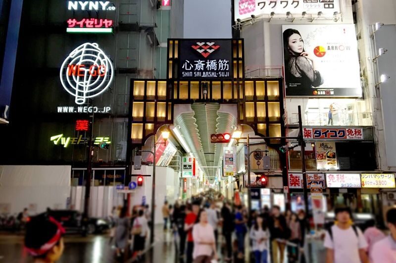 Osaka City, Osaka Castle, Kuromon Market, & Dotonbori Walking Tour - Shitenno-ji trades castle defenses for calm temple grounds