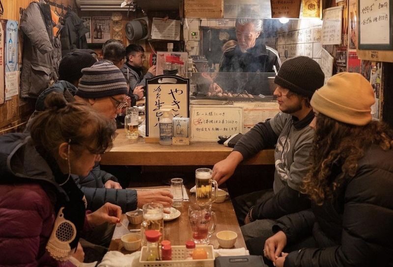 Osaka Dotombori Food & Local Izakaya Bar Crawl Tour - The first izakaya: food, drinks, and a hands-on start