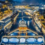Private Guided Day Tour from Zhangjiajie to Furong Ancient Town + Fenghuang Ancient City/Morong Miao Village - Fenghuang: riverside houses and a city visit