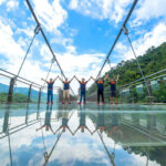 Qingyuan Gulong Gorge Drifting Glass Grand Canyon - The 101-meter waterfall is the scenic anchor