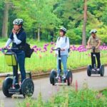 Saitama Forest Park Segway Tour in Musashi-Kyuryo National Government Park - Following the guide through seasonal park grounds
