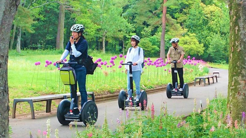 Saitama Forest Park Segway Tour in Musashi-Kyuryo National Government Park - Following the guide through seasonal park grounds