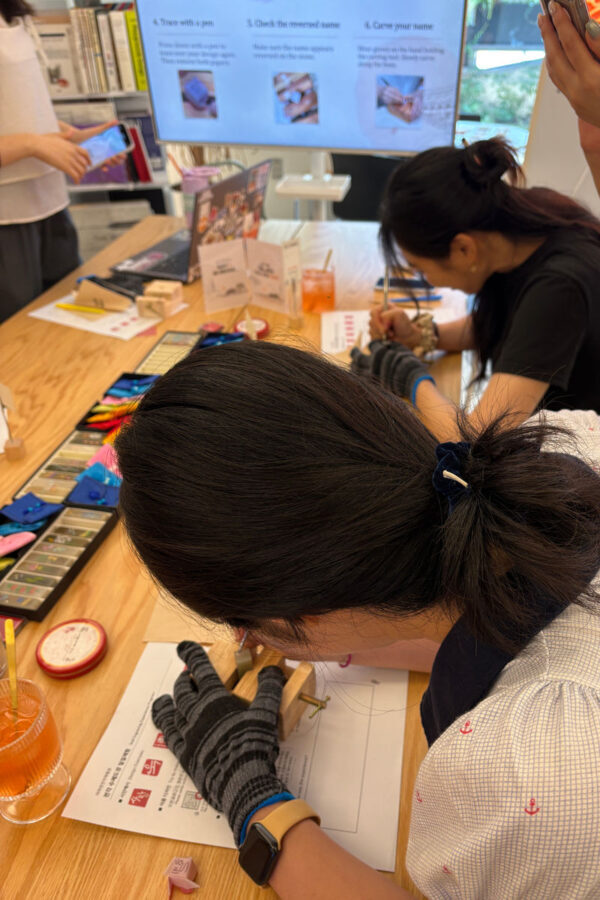 Seoul Haebangchon: Korean Name Seal Making(Your Personalized Seal) - Choosing a design, then making the mark