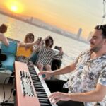 Sunset Catamaran Cruise in Barcelona with Live Music - Music, drinks, and the onboard mood